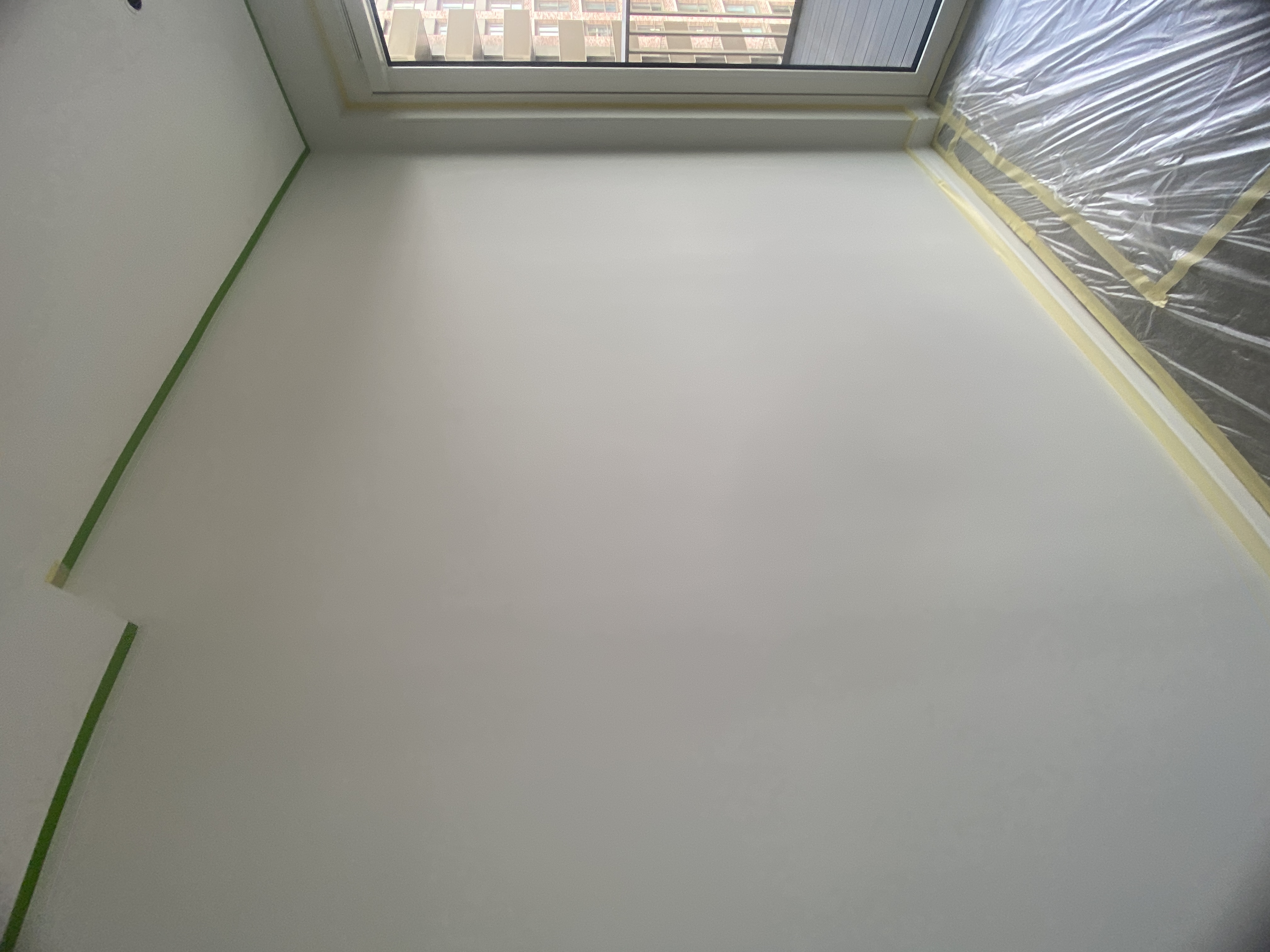 Bedroom wall before painting with House of Hackney paint